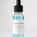 Copper Peptide Prep Serum in a 30 mL glass dropper bottle with pale blue serum, on a white background