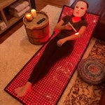 Total Body Reset system family — mat with face mask and wand (kit context)