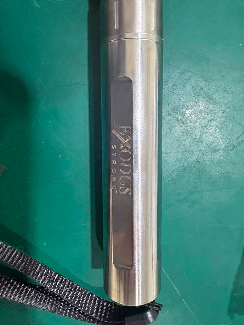 Exodus Strong logo etched on the Red Light Wand