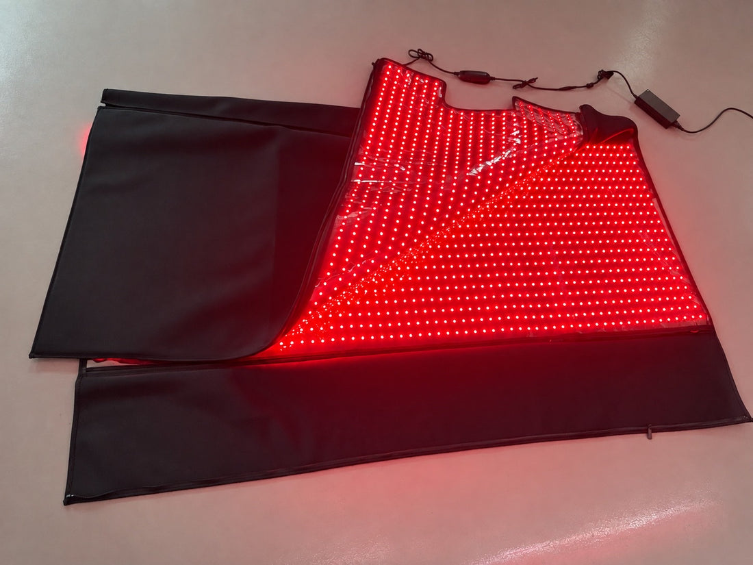 Red Light+ Blanket half open from the side, the lit panel and the controller cables