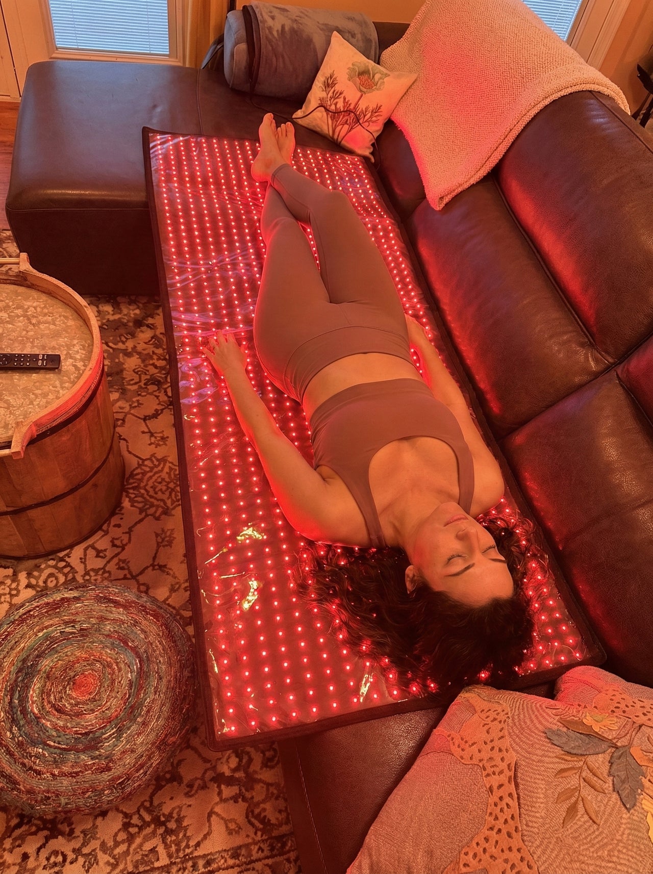 Home use — Total Body Reset mat on couch