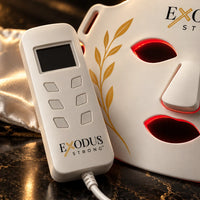 Close-up of the Red Light+ Face Mask controller beside the mask