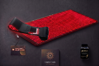 Total Body Reset kit with the Red Light Belt: full-body red light mat, wearable belt, frequency relief card, Exodus supplement, and the Light Code Daily Prayer Guide